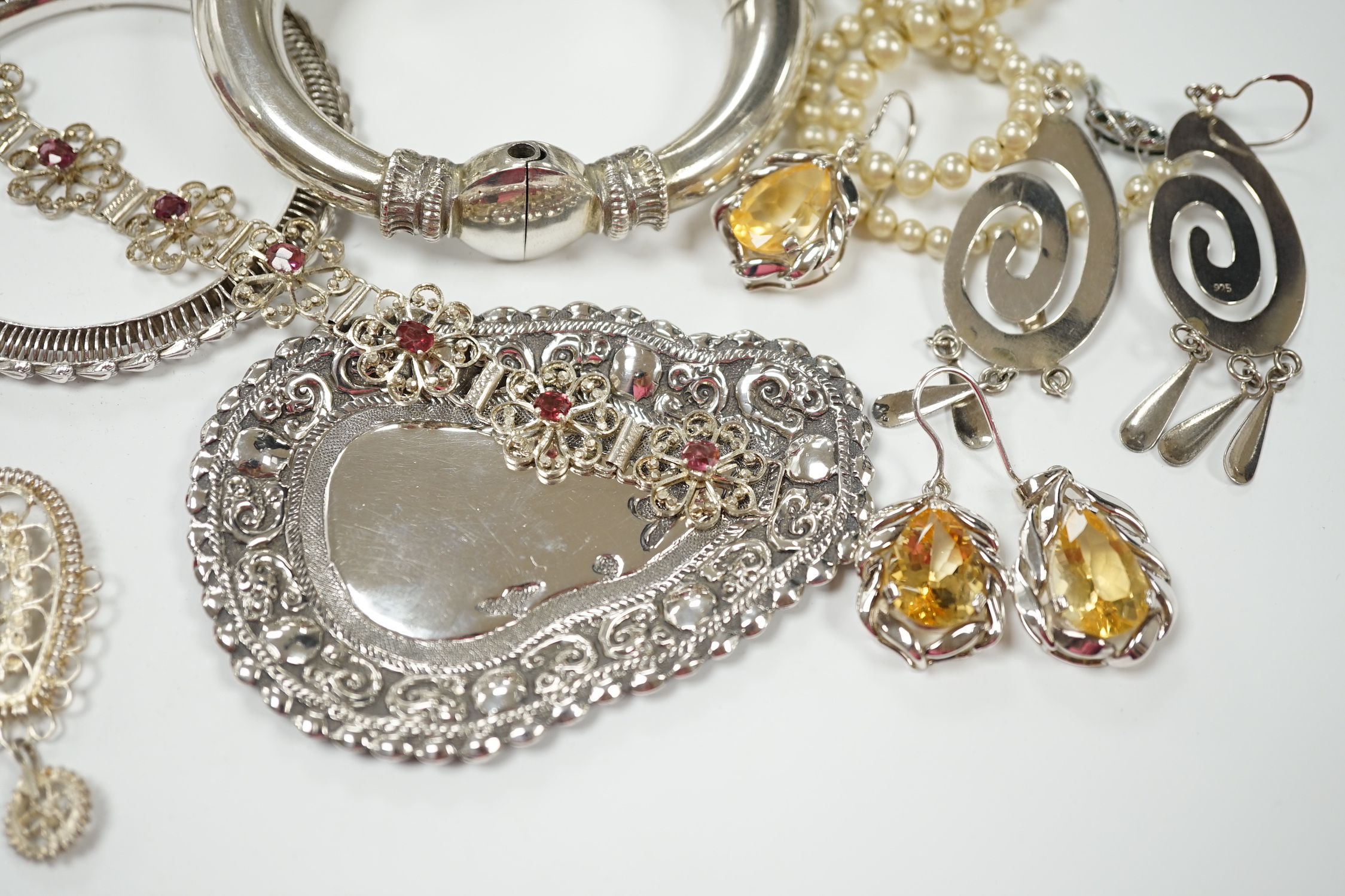 A quantity of assorted white metal jewellery, including bangle, necklace, earrings, etc.